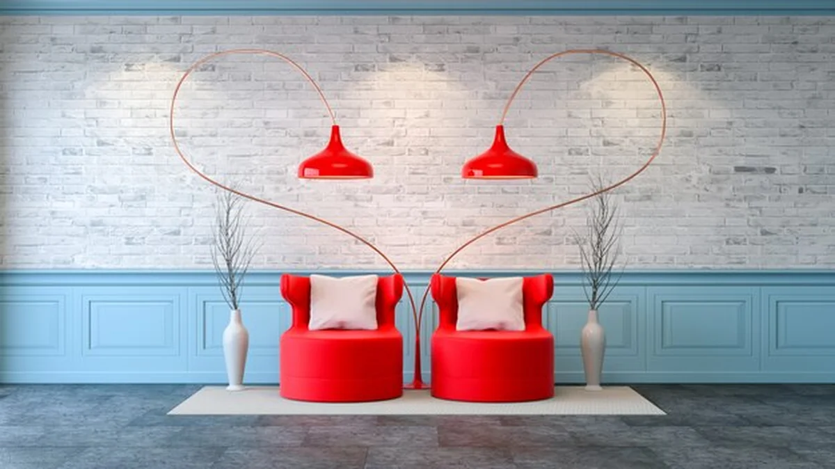 Nowoczesny loft z czerwonymi kafelkami na jasnoszarym tle ceglanej ściany